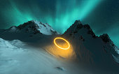 Futuristic circle made with neon lights in the snow mountain