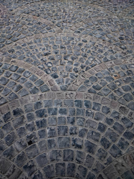istock Textured stone pavement of street 1305747991