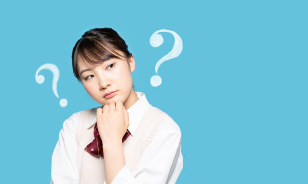 istock Thinking asian high school girl. 1305752120