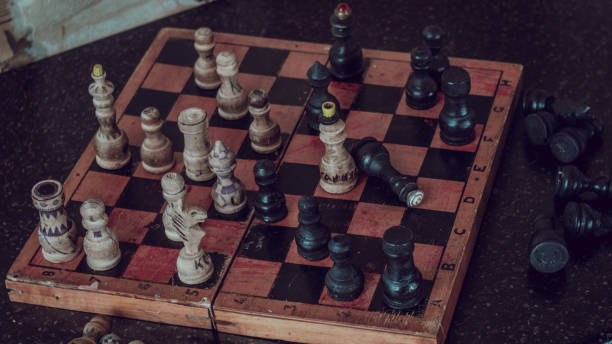 istock Old, homemade, painted chess in 1990. A game for development and thinking 1305754814