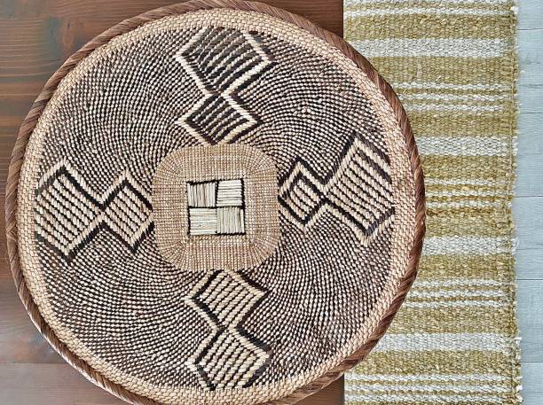 istock Woven Tray on Wood Table with 1305755912