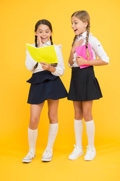istock School friendship. Most important thing one learns in school is self esteem support and friendship. Friendship goals. Cute school girls with books. First day at school. Sharing gossips personal diary 1305757026