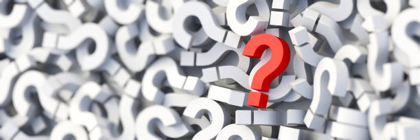 istock Red question mark on a background of white signs, FAQ Concept 1305761055