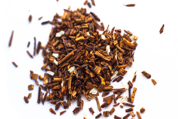 istock red rooibos tea, isolated heart shaped pile 1305761977