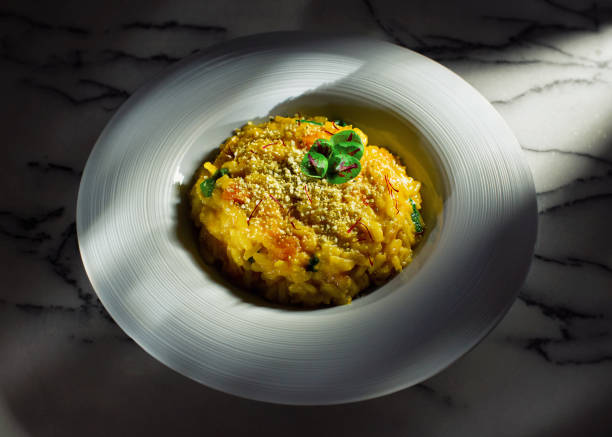 istock Butternut Squash Saffron Risotto with Pumpkin Seed Plant Based Parmesan for Fine Dining 1305762832