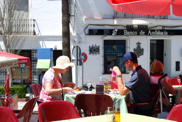 Pavement cafe, Mijas, Spain. Alfresco dining at a pavement cafe in the village centre, Mijas, Spain. mijas pueblo stock pictures, royalty-free photos & images