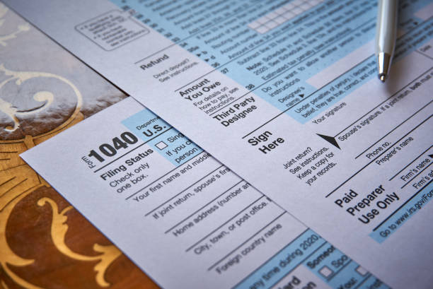 US 1040 Tax Form US 1040 Tax Form 1040 tax form photos stock pictures, royalty-free photos & images