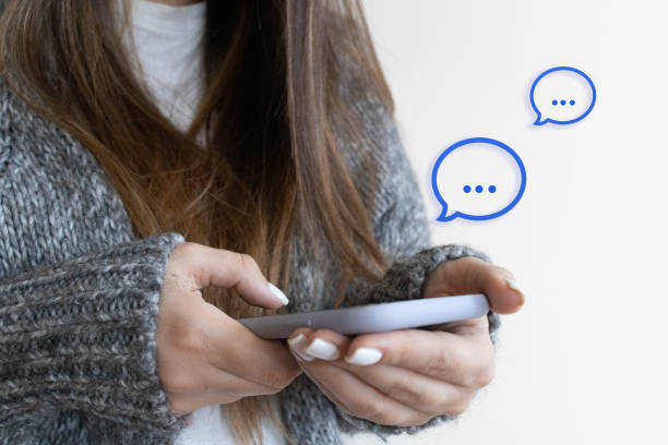 istock Women's hand typing on mobile smartphone, Live Chat Chatting on application Communication Digital Web and social network Concept. 1305767412