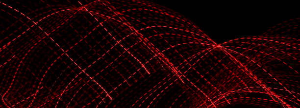 istock red dotted lines of lights on a black background 1305769255