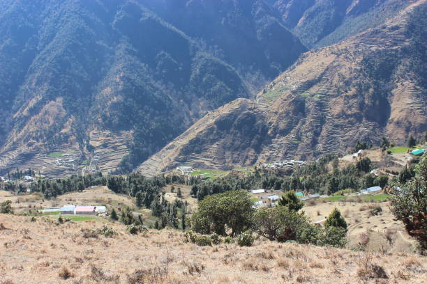 istock view of a himalayan village in a mountain valley. 1305770341