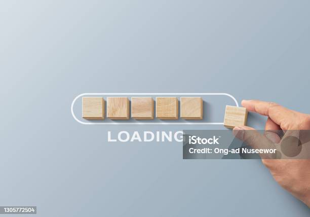 Loading Reload Loading Reboot Refresh Or Mindset Concept Hand Putting Wooden Blocks In ...