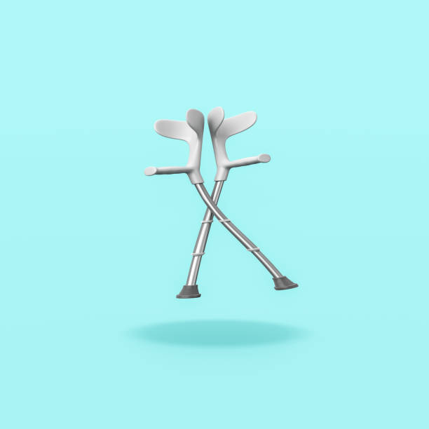 istock Pair of Crutches on Blue Background 1305776789