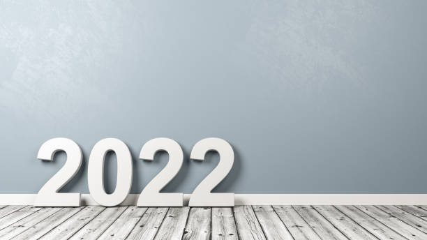 istock 2022 Number Text on Wooden Floor Against Wall 1305776868