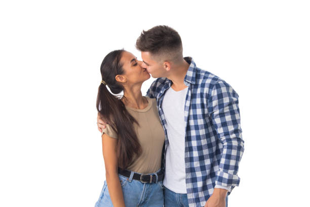 istock Couple kissing isolated on white 1305782826
