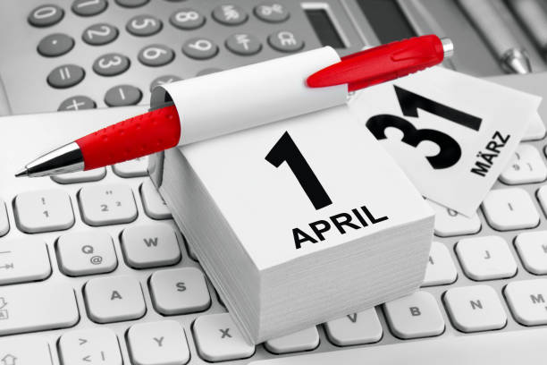 istock Workplace with German calendar April 1 and PC keyboard 1305783643