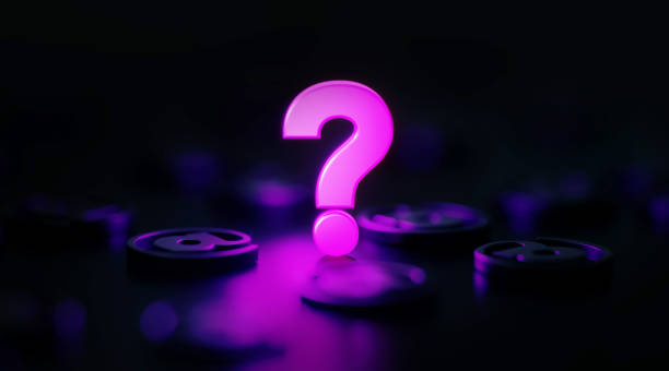 istock Q And A Concept - Question Mark Glowing Amid Black At Symbols On Black Background 1305786231