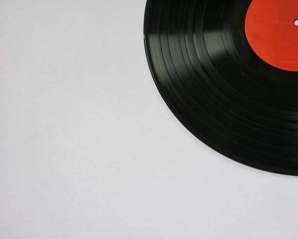 istock Part of a vinyl disc records against white background 1305787180
