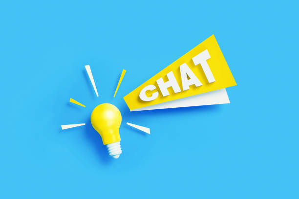 istock Idea And Chat Concept - Light Bulb With White Chat Text Sitting On Blue Background 1305788544