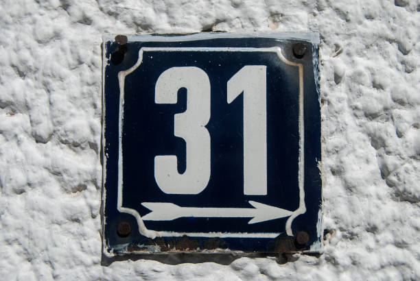 istock Weathered enamelled plate number 31 1305789692