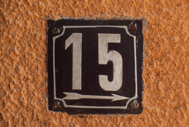 istock Weathered enamelled plate number 15 1305789700