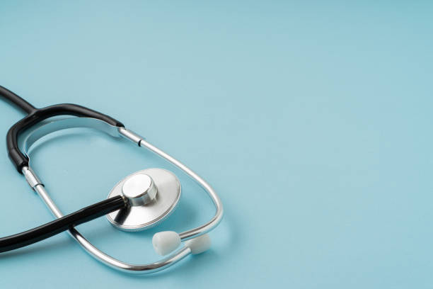 istock Stethoscope on blue background with a copy space. Medical concept. 1305791059