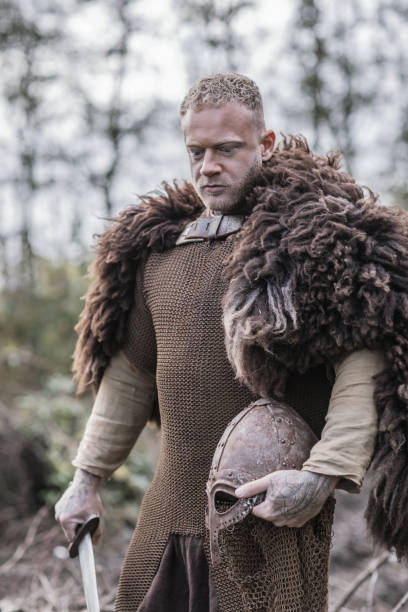 istock A handsome viking warrior in a forest 1305796494