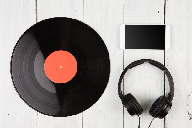 istock Vintage record LP, smartphone and headphones 1305798218