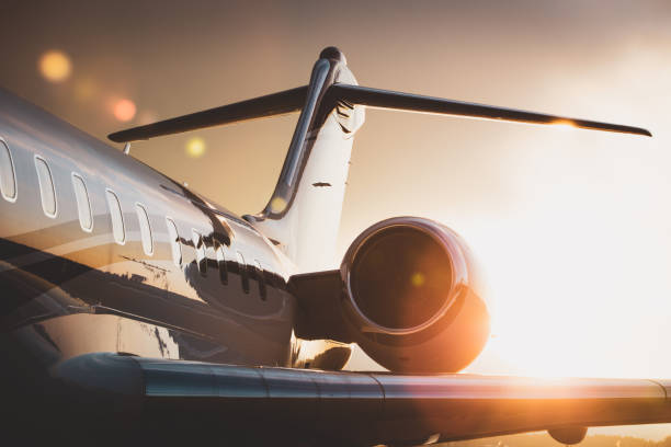 Corporate Jet Corporate Jet at sunset jets stock pictures, royalty-free photos & images