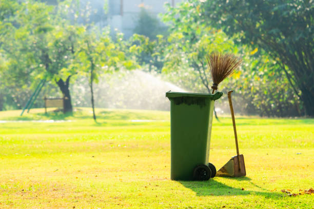 istock The green recycle bin with cleaning tool in public park 1305806621
