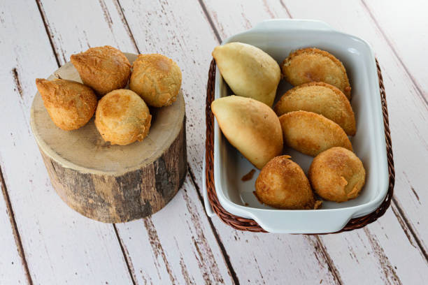 istock Small Brazilian savorys. With varied fillings, cheese, ground beef and chicken. 1305807199