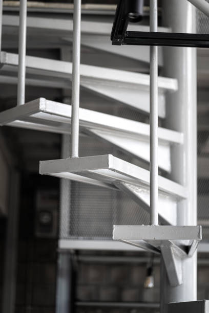 istock Metal part of sprical staircase. 1305809981