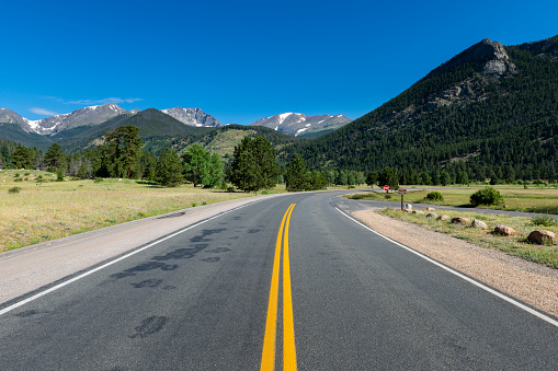 View of the US route 34 at the Rocky Mountains National Park, near the west horseshoue park, in the State of Colorado, USA