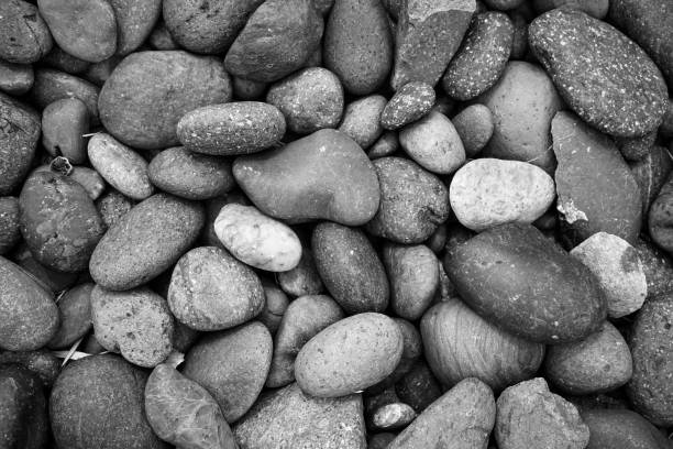 istock Pebbles stone or river stone  background with vintage filter 1305816266