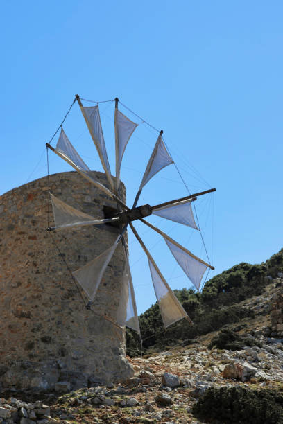 istock traditional windmill - Lasithi Plateau, Crete, Greece 1305818604