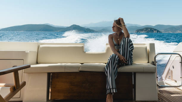 istock Woman on luxury yacht. 1305818778