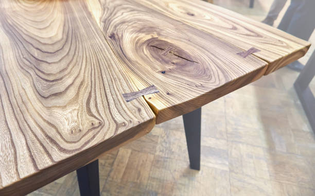 istock Live edge elm slab table with bow tie joint 1305819145
