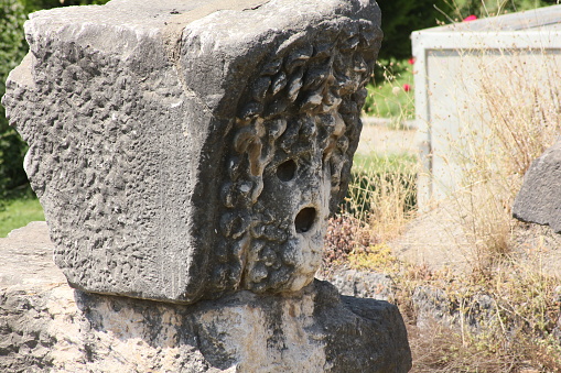 Bursa, Turkey-July 7, 2012: Medusa Head Carved from Stone on the Door of Iznik City Walls.