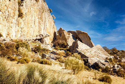 Huge rock fallen down from a cliff side in southern Spain