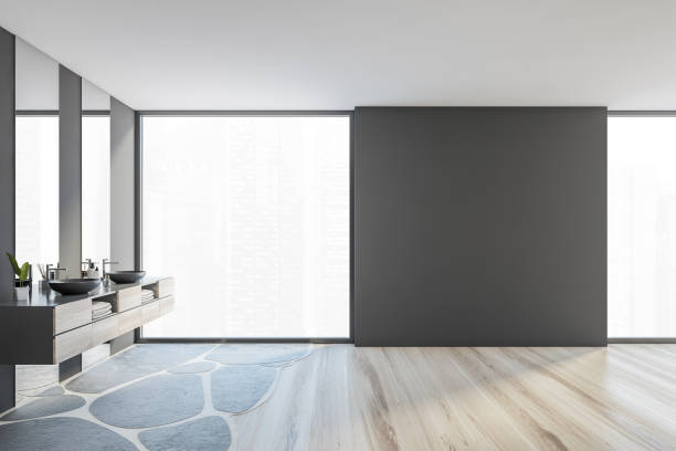 istock Mockup copy space in grey and wooden bathroom with two sinks and window 1305821757