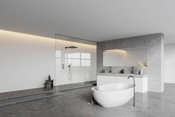 istock Modern white bathroom corner with tub and shower 1305822084