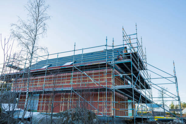 istock Close up view building under construction on blue sky background. Industry concept. Sweden. 1305824198