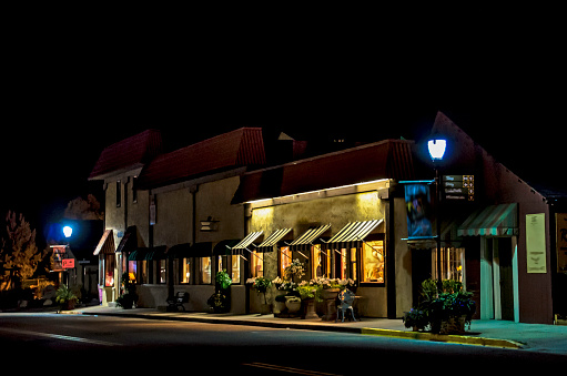Small and old town shops at night in western USA