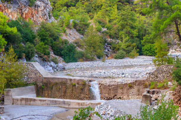 Small waterfall on mountain river in Kesme Bogaz canyon, Antalya province in Turkey Small waterfall on mountain river in Kesme Bogaz canyon, Antalya province in Turkey bogaz stock pictures, royalty-free photos & images