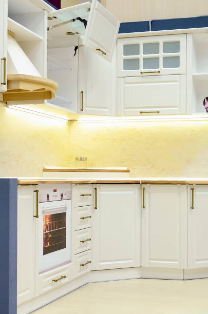 istock Beautiful white kitchen in a classic style. Vertical photography. 1305831833