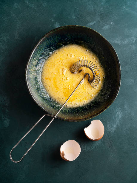 Mixing egg with sugar, Whisking egg with sugar,  Whipped eggs and sugar, Egg yolk is whipped