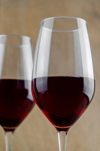 Two glasses with red wine close-up. Drinking wine. Wineglass.