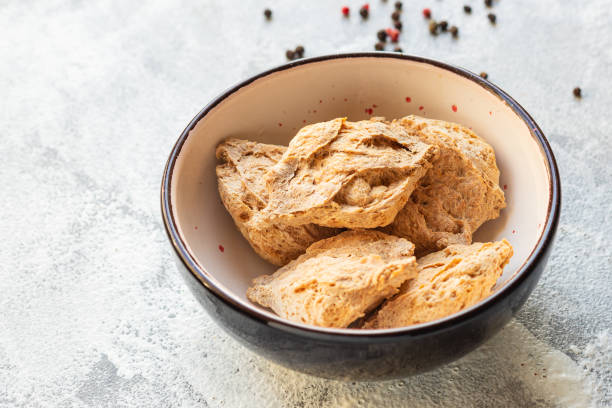 seitan soy meat raw pieces ready to cook snack healthy meal copy space food background rustic image vegan or vegetarian seitan soy meat raw pieces ready to cook snack healthy meal copy space food background meat substitute stock pictures, royalty-free photos & images