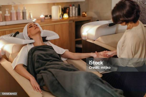 Woman Enjoying Hair Spa Treatment Stock Photo - Download Image Now - Spa,  Washing Hair, Massage Chair - iStock