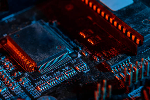 istock Electronic components on a printed circuit board. Resistor, inductor and capacitor on PCB. Concept Electrical engineering, microprocessor, technology. Selective focus. 1305840731