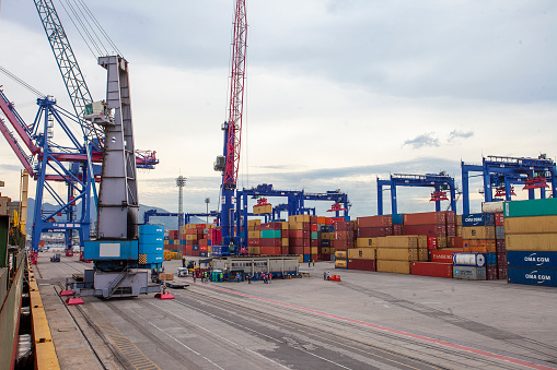 Containers stacked in the background